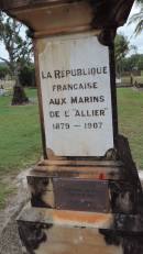 
La Republique Francaise aux Marins De LAllier
1879-1907

From FNS La Place
29 Aprril 1993
En Souvenir

This column was erected by the French Govt in memory of French nationals who fell victim to yellow fever ??? In those days victims ???

were washed onto shore ??
French sailors and interred here.

1er Avril 1989
Patrouilleur
"La Glorieuse"
Mar ne Nationale
Alliance Francaise

French sailors
Died 1879
Ages unknown

Four unknown French sailors were
re-interred here in 1907. They and 76
fellow passengers and crew of the naval
ship Allier, died at sea early in 1879. They
were on a voyage from France to New
Caledonia when yellow fever soon
after a refuelling stop in Java.
The Allier diverted to Cooktown for
medical assistance. A rudimentary
quarantine station was established on the 
north shore of the Endeavour River.
After a stay of nearly two months the
survivors set sail for New Caledonia.

Four bodies were washed ashore
following a 1907 cyclone. They were
identified as victims who had died soon 
after the Allier had arrived off Cooktown.

Cooktown Cemetery

