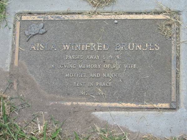 Aisla Winifred BRUNJES,  | 1912 - 1991,  | died 5-9-91,  | wife mother nanny;  | Goomeri cemetery, Kilkivan Shire  | 