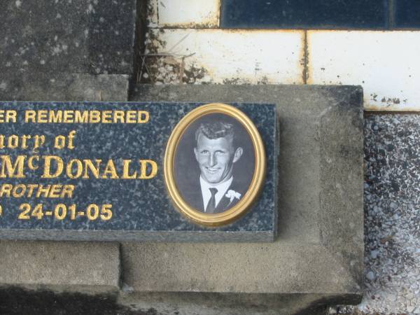 Stanley Angus MCDONALD,  | husband father,  | died 11 July 1959 aged 56 years;  | Florence May MCDONALD,  | mother,  | died 24 June 1988 aged 77 years;  | Stanley Michael MCDONALD,  | husband father brother,  | born 21-11-41,  | died 24-01-05;  | Murwillumbah Catholic Cemetery, New South Wales  | 